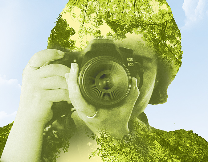 stylized image of a person combined with a green leafy texture holding a camera pointed directly at the observer