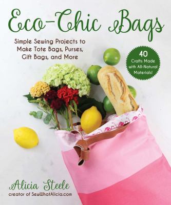 Bright pink cloth tote stuffed with flowers and a french loaf. Lettering in green.